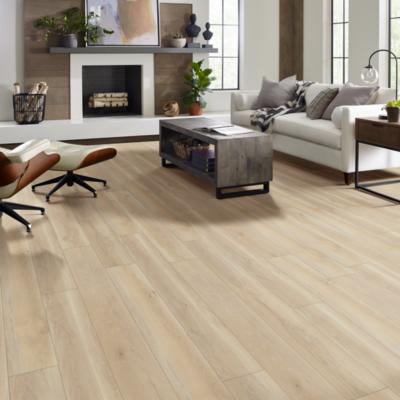 luxury vinyl plank flooring in living room with midcentury modern decor.